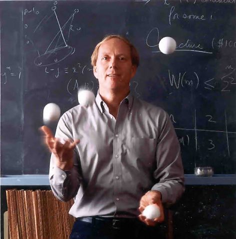 Photo of Ron Graham juggling in the classroom