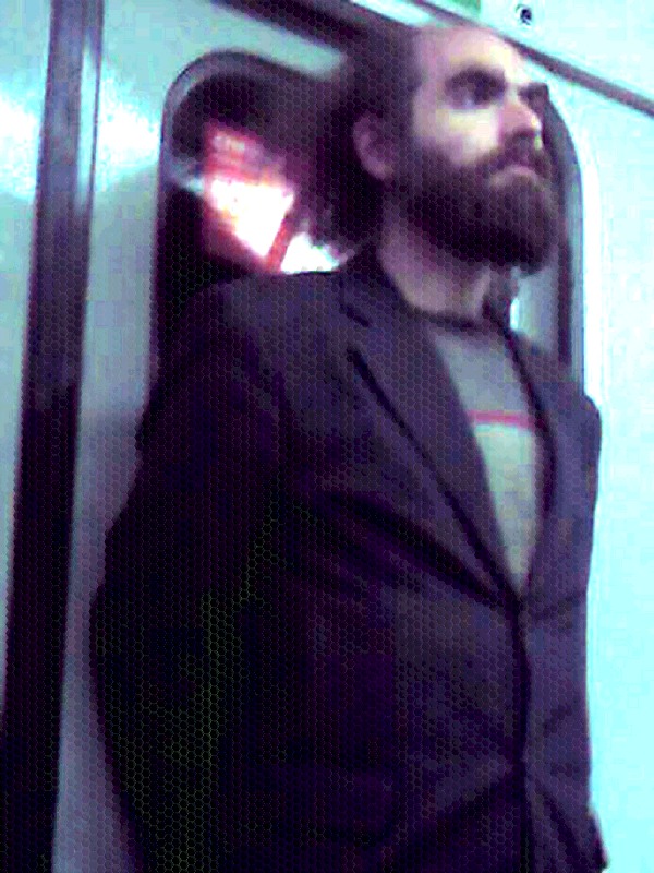 Bearded man standing tall, mobile snapshot, art dots