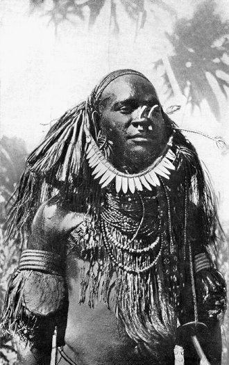 Traditionally dressed up man, Marind Anim, South New Guinea, interbellum