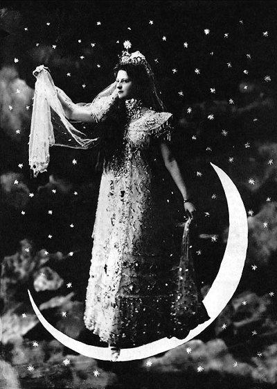 Princess holding veil stands on a paper moon surrounded by stars